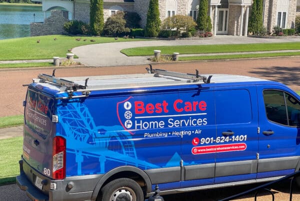A Best Care Home Services truck parked on a residential street.